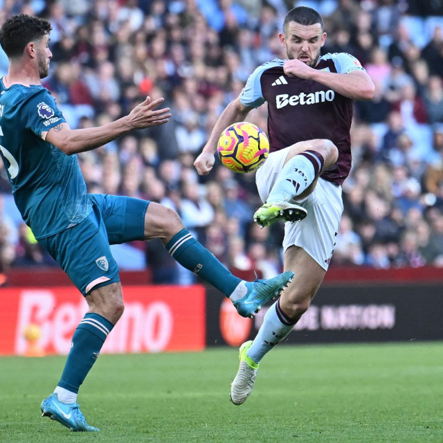  Marcos Senesi i John McGinn