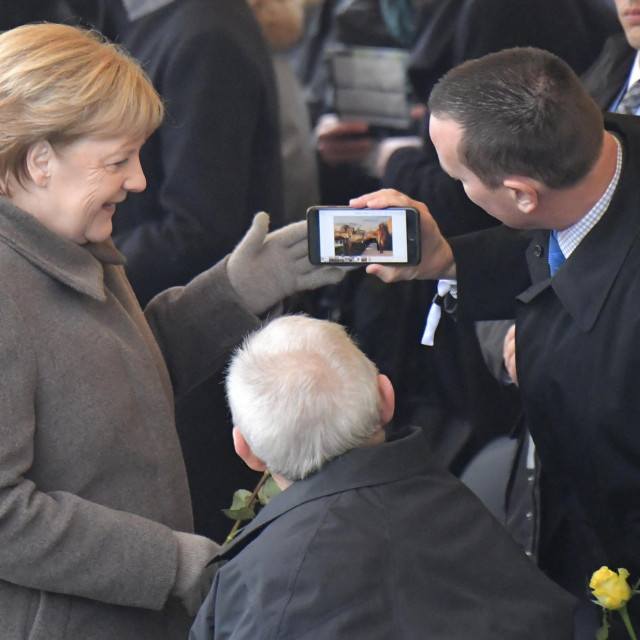 Richard Grenell i Angela Merkel