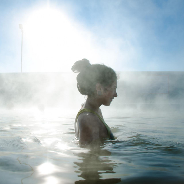 swimming in thermal water pool