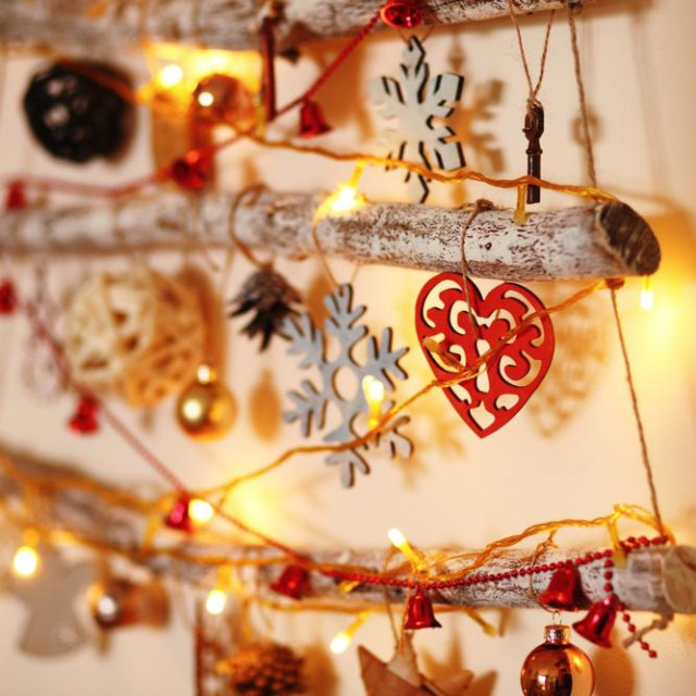 hanging on the wall alternative wooden christmas tree/ with wooden tree decorations/christmas and new year background