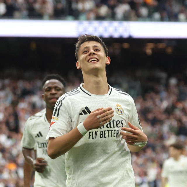 Real Madrid‘s Turkish midfielder #15 Arda Guler celebrates scoring the opening goal during the Spanish league football match between Real Madrid CF and RC Celta de Vigo at Santiago Bernabeu Stadium in Madrid on May 4, 2025. (Photo by Pierre-Philippe MARCOU/AFP)