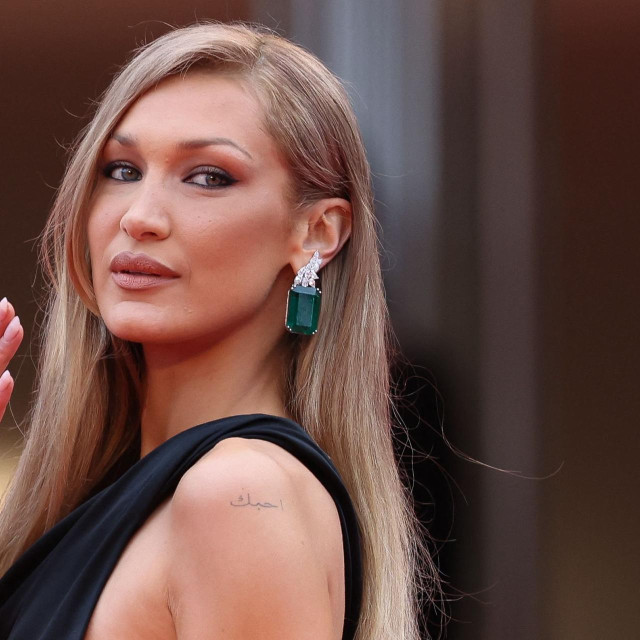 US model Bella Hadid arrives for the Opening Ceremony and the screening of the film ”Partir un Jour” (Bye Bye) presented out of competition at the 78th edition of the Cannes Film Festival in Cannes, southern France, on May 13, 2025. (Photo by Sameer AL-DOUMY/AFP)
